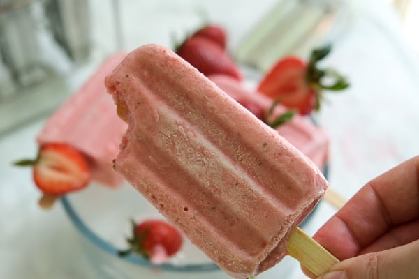 bite of strawberry paletas